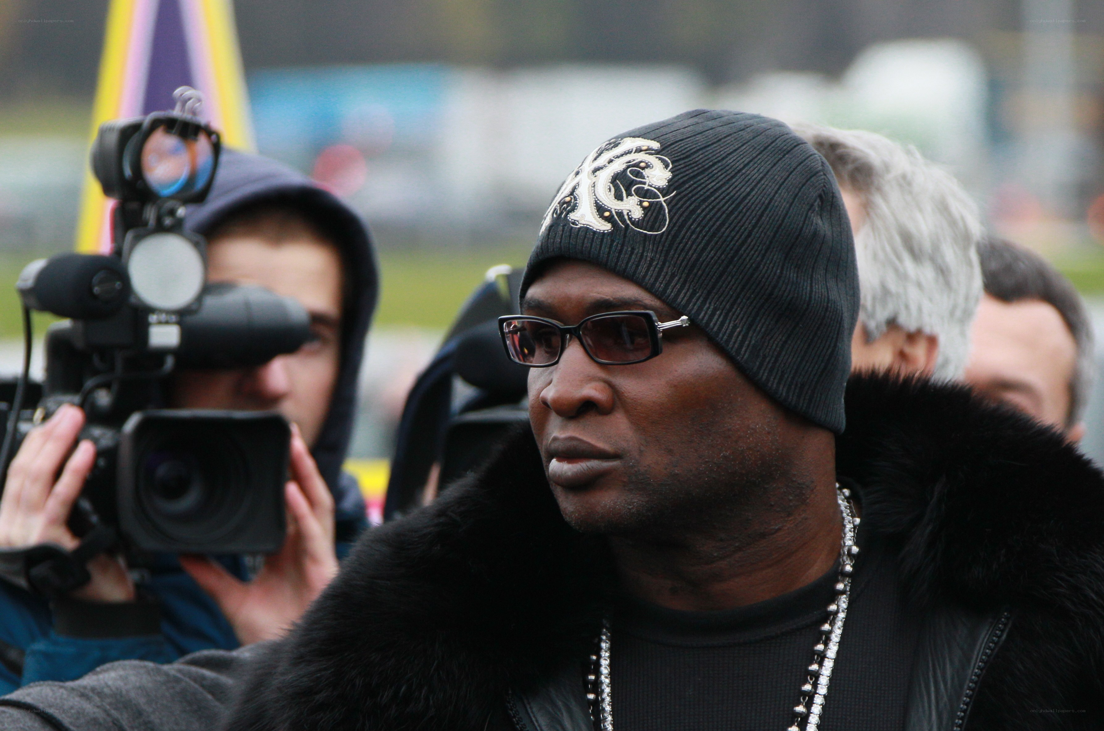 Man in black beanie and glasses