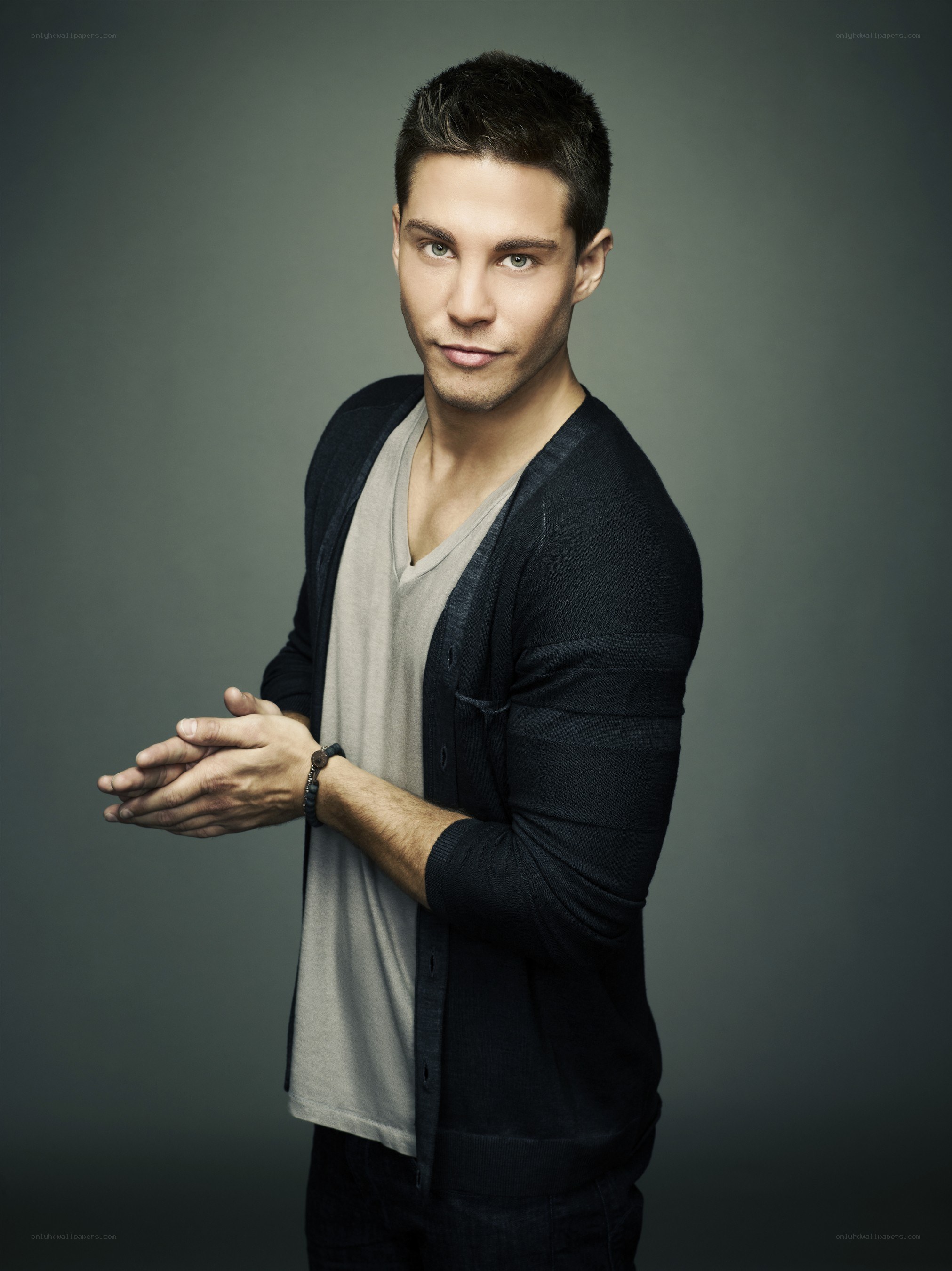 man in black cardigan