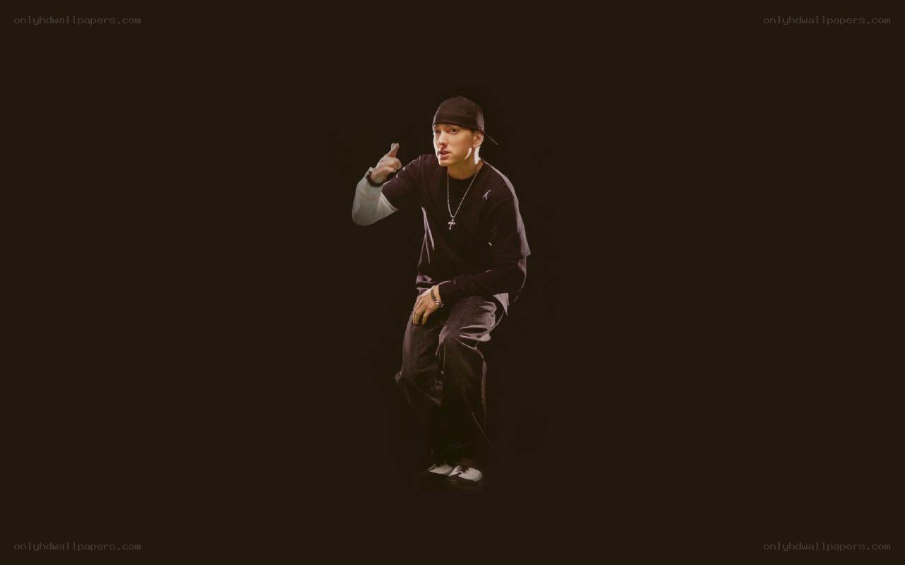 man in black clothing pointing