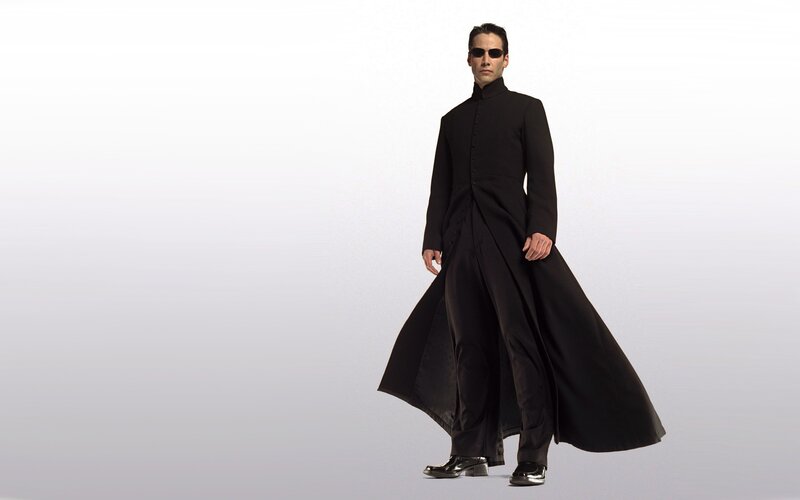 man in black coat and sunglasses