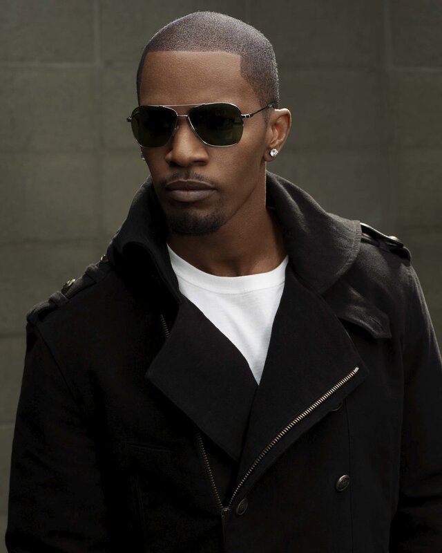 man in black coat and sunglasses