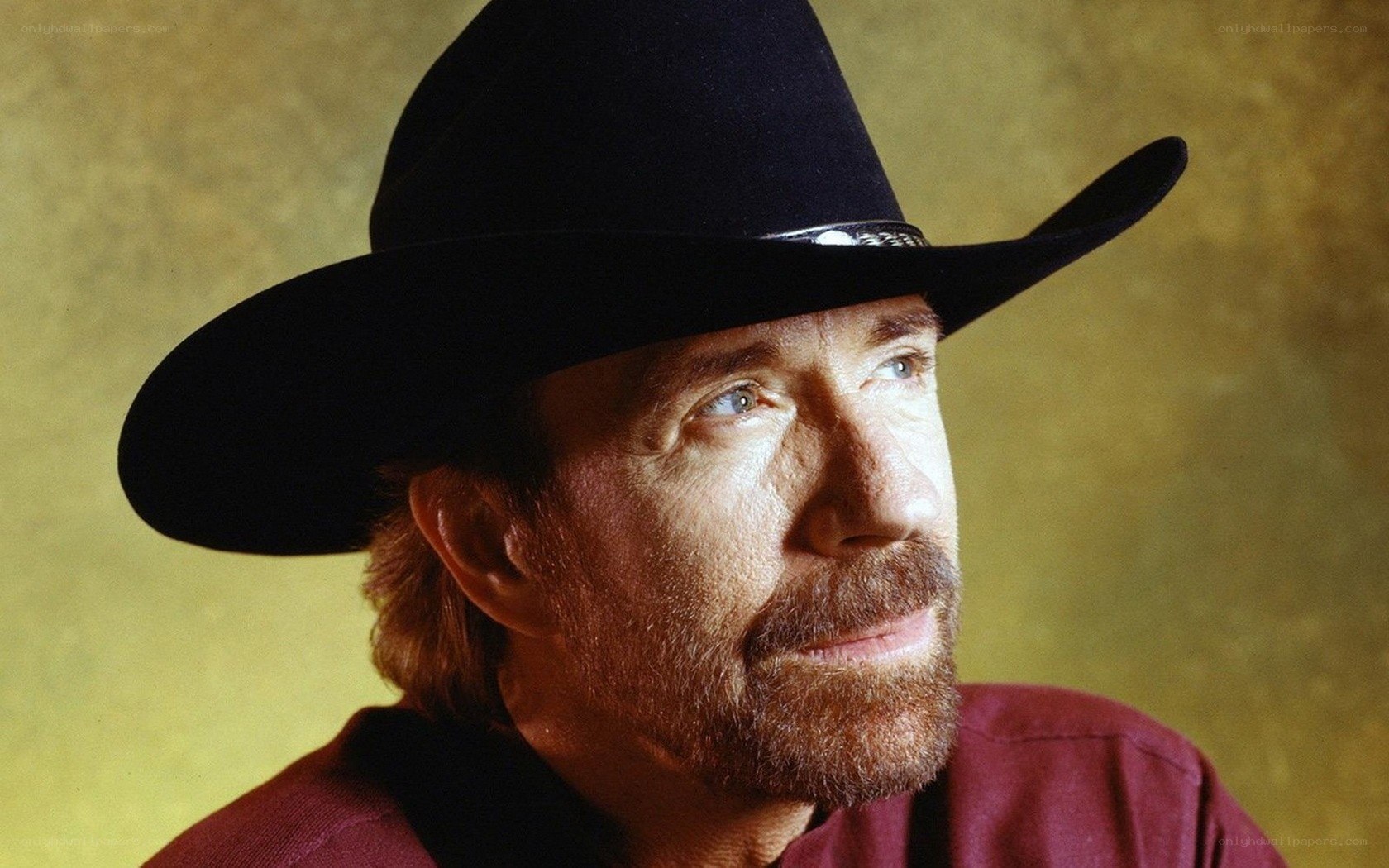man in black cowboy hat