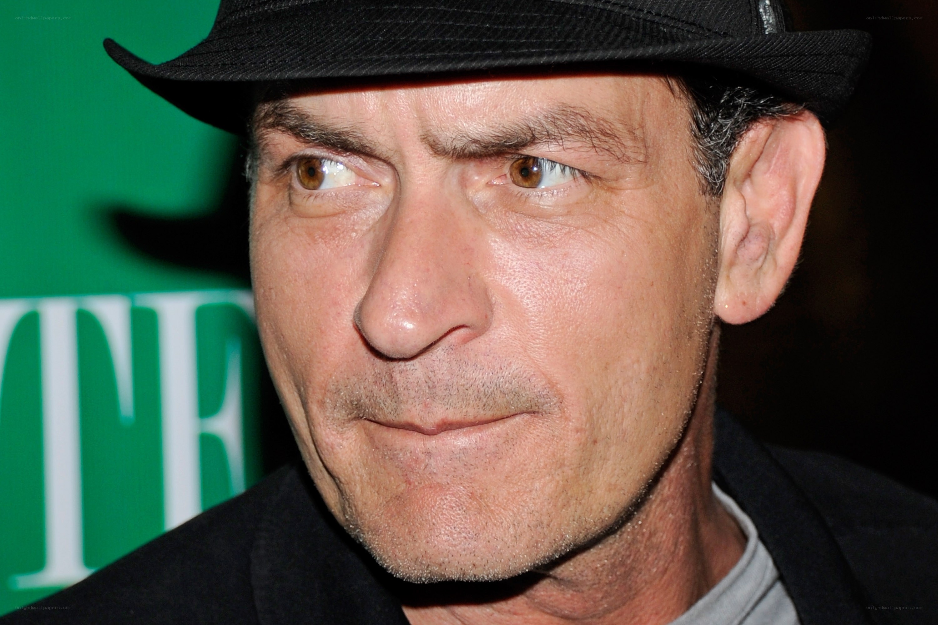 man in black hat close-up