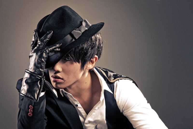 Man in Black Hat — Dramatic, Photograph, Gloves