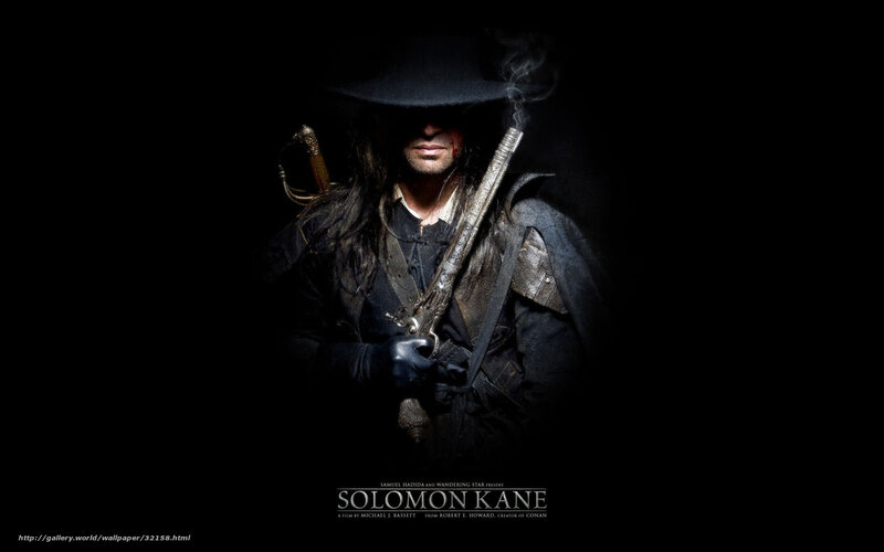 Man in Black Hat Holding Gun