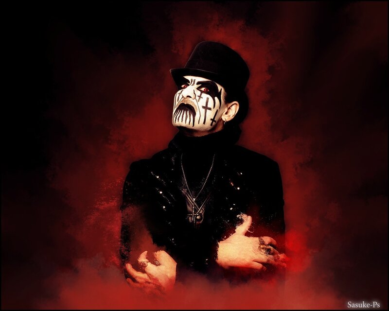 Man in black hat with face paint