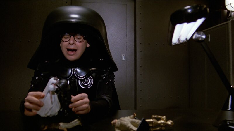 Man in Black Helmet