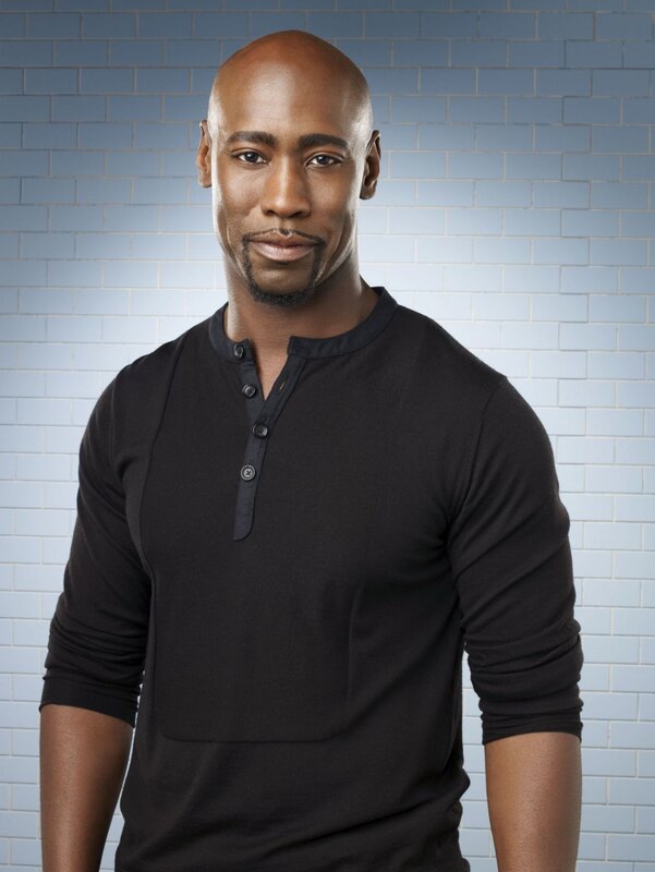 man in black henley shirt