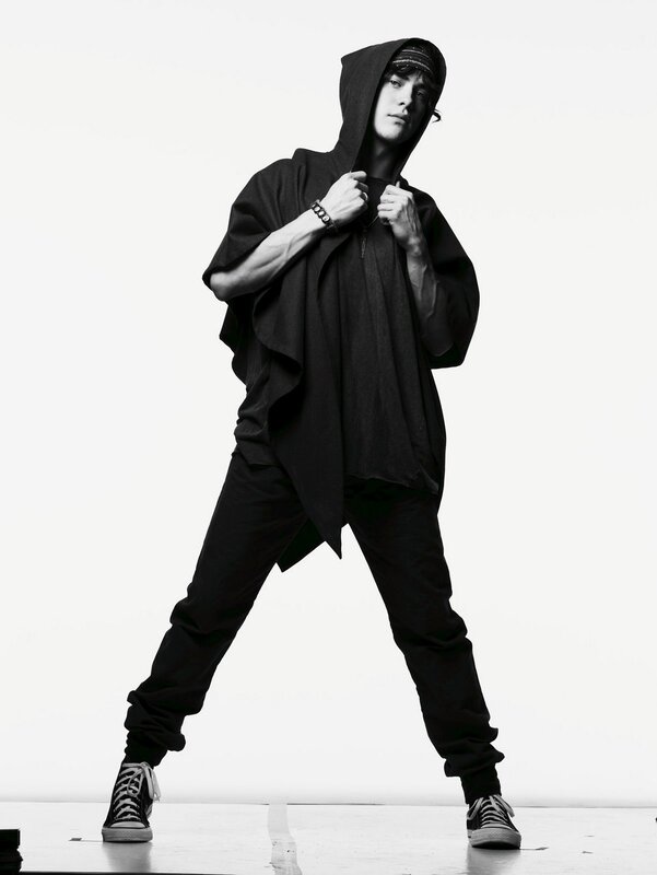 man in black hoodie posing