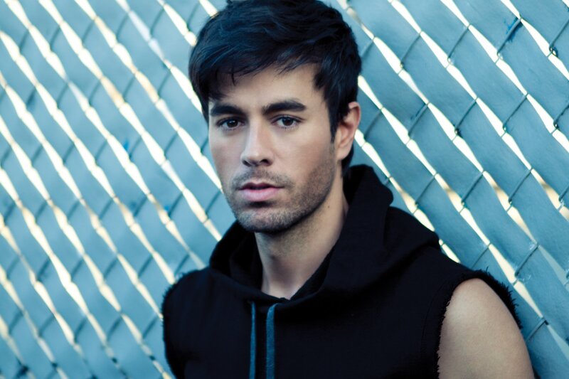 Man in Black Hoodie — Serious, Photograph, Chain-link Fence