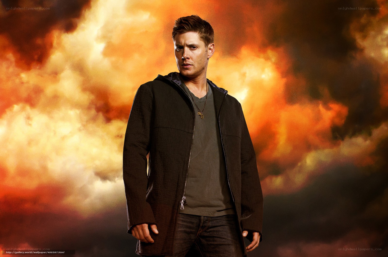 man in black jacket against fire