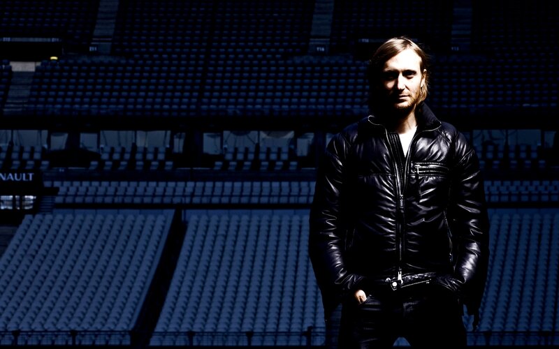 Man in Black Jacket — Dramatic, Photograph, Stadium Seats