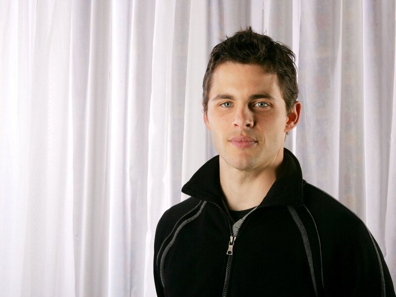 Man in Black Jacket — Neutral, Photograph, Curtains