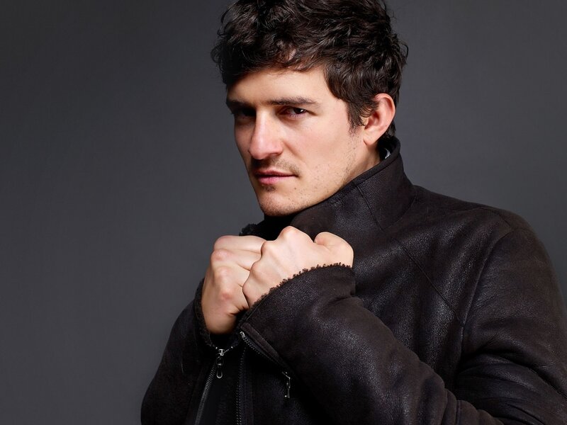 Man in Black Jacket — Serious, Photograph, Fists