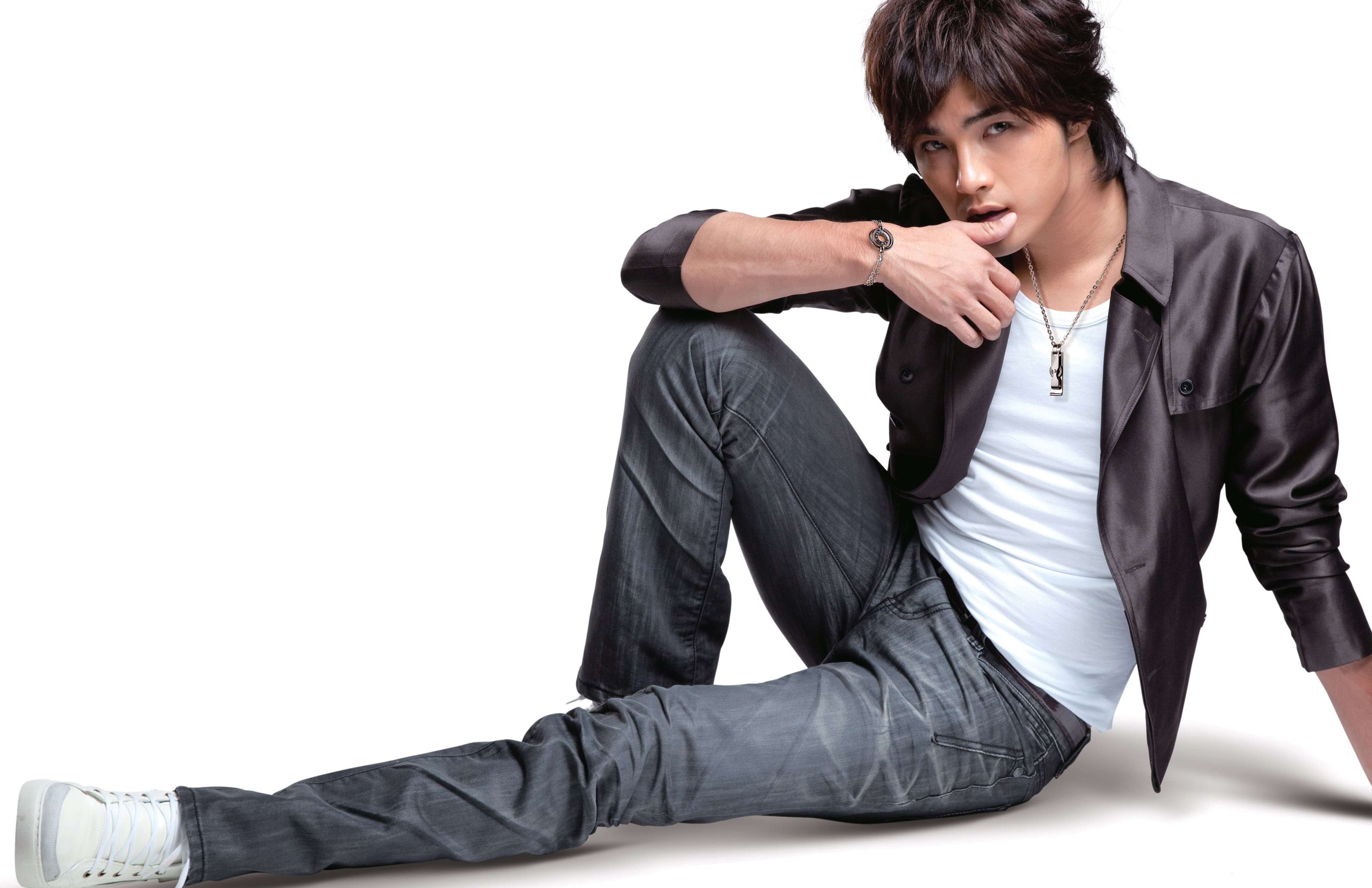 man in black jacket sitting