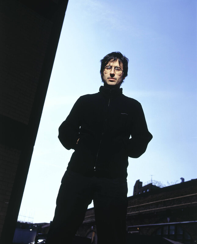 man in black jacket standing