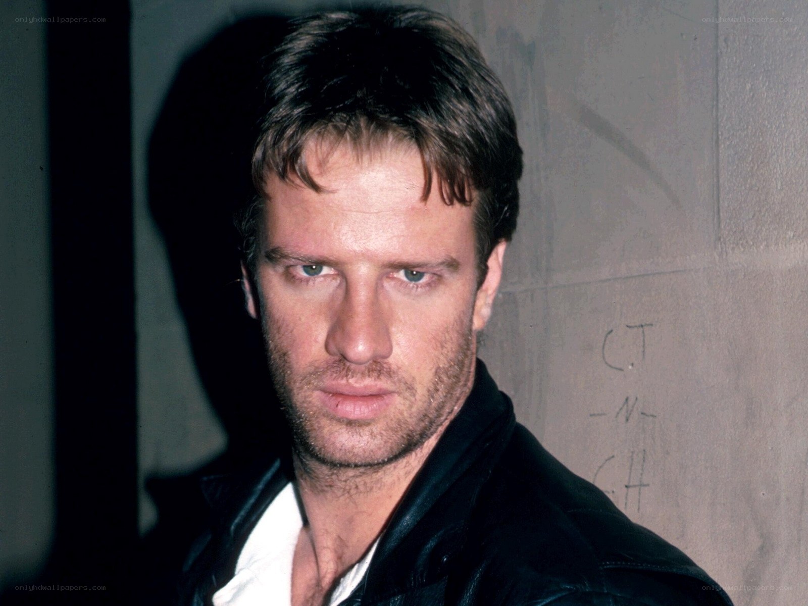 man in black leather jacket