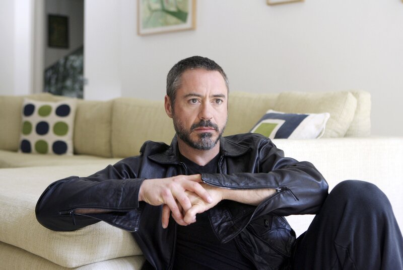 Man in Black Leather Jacket — Contemplative