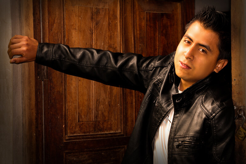 Man in Black Leather Jacket — Dramatic, Photograph, Wooden Door