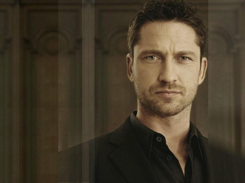 Man in Black Shirt — Brown, Serious