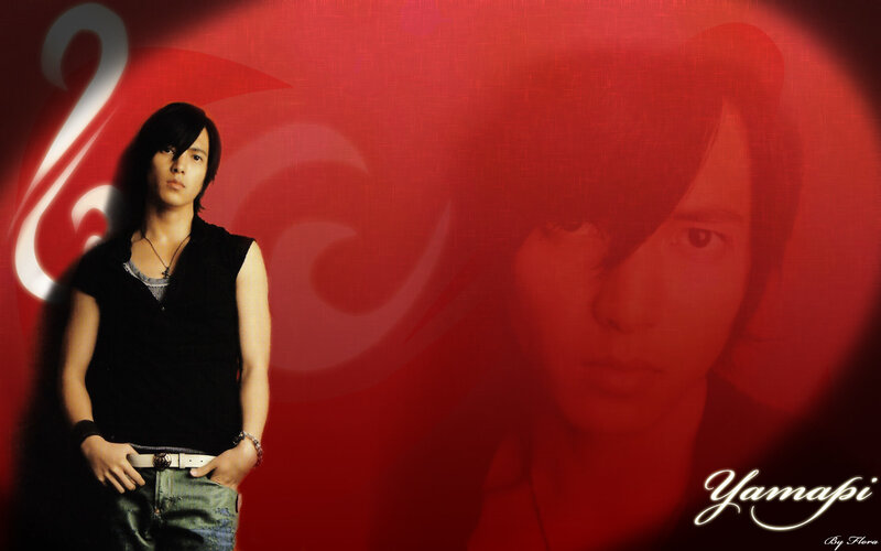 man in black shirt on red background