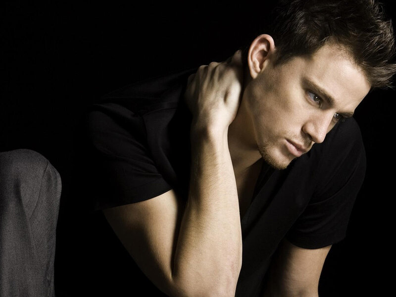 man in black shirt posing