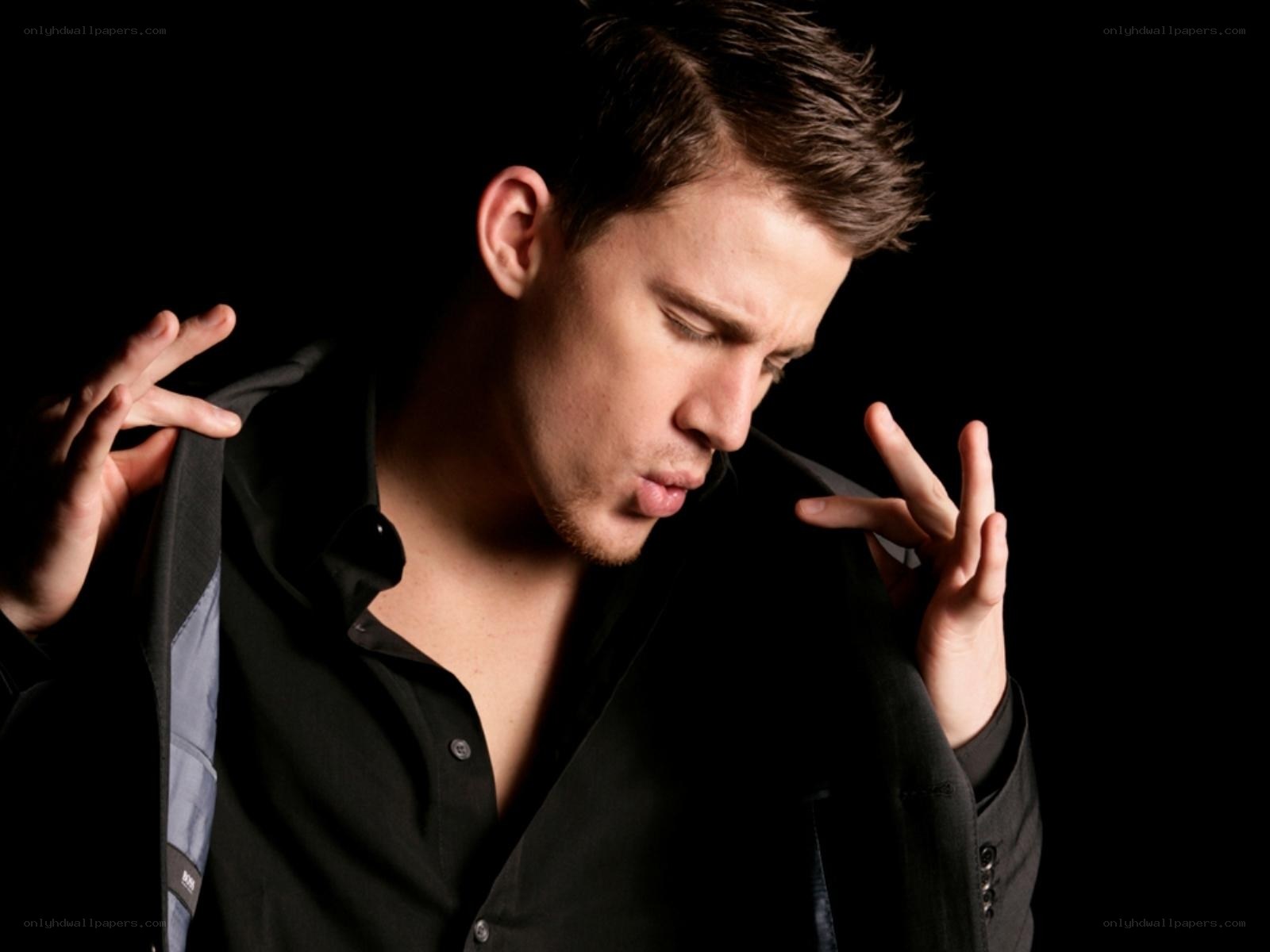 man in black shirt posing