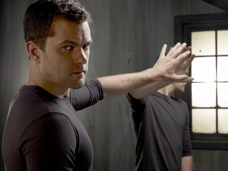 man in black shirt practicing martial arts