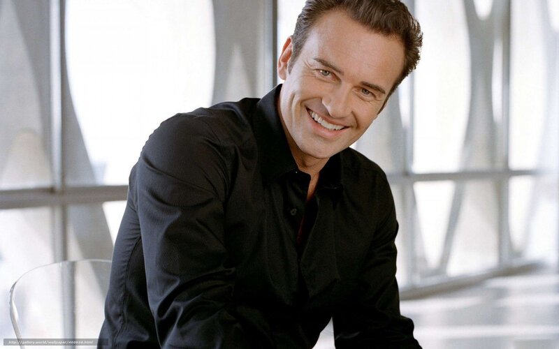 Man in Black Shirt — Smiling, Photograph