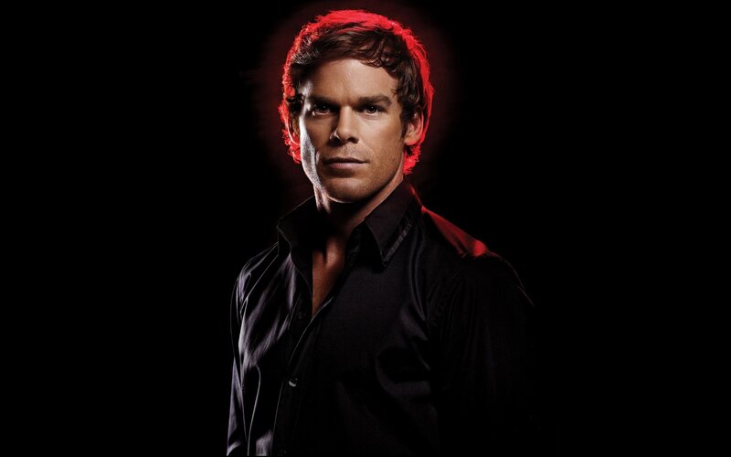 man in black shirt with red lighting