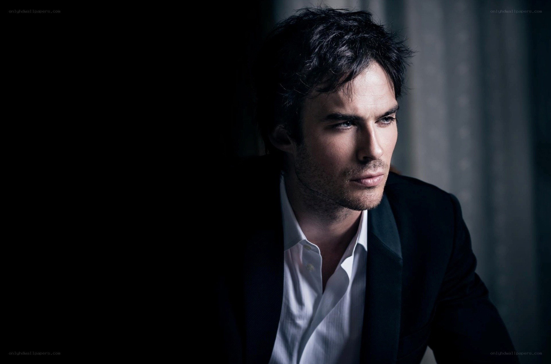 man in black suit