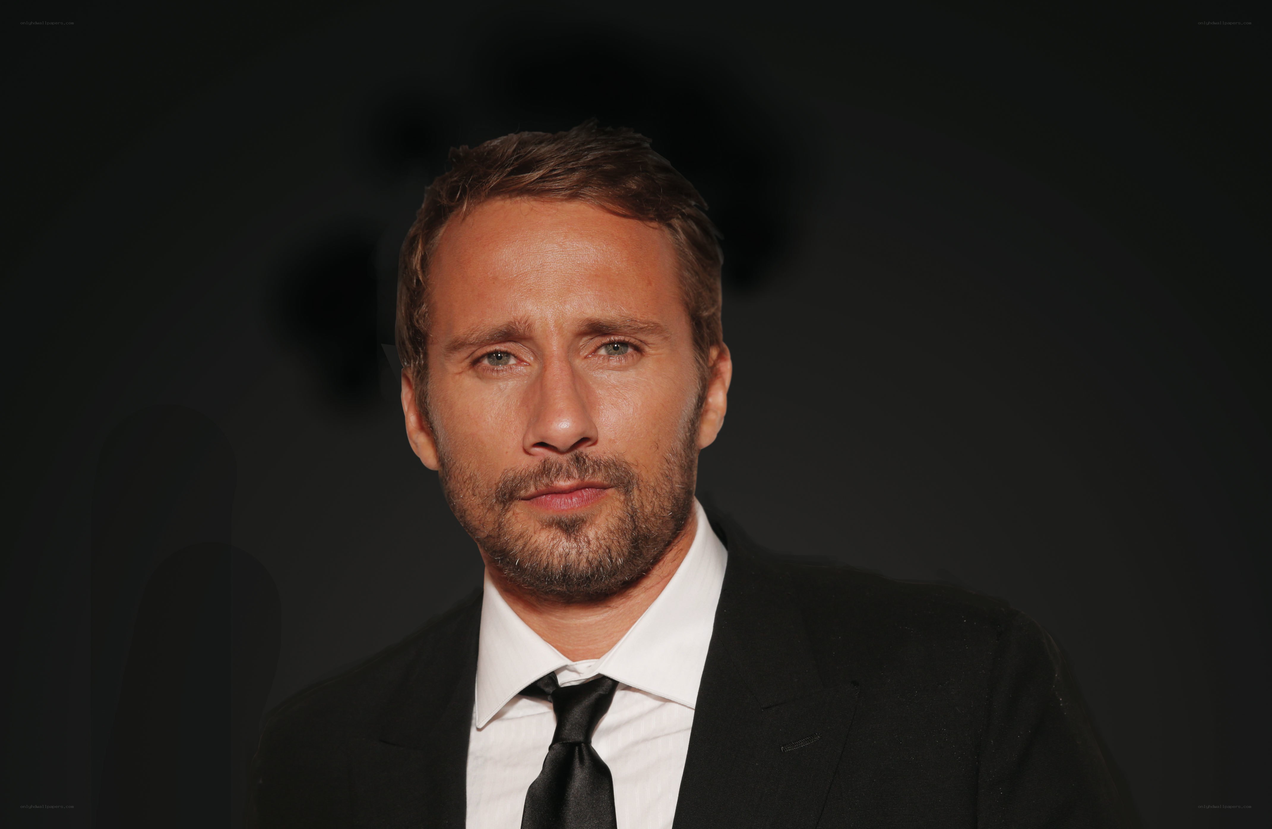 man in black suit
