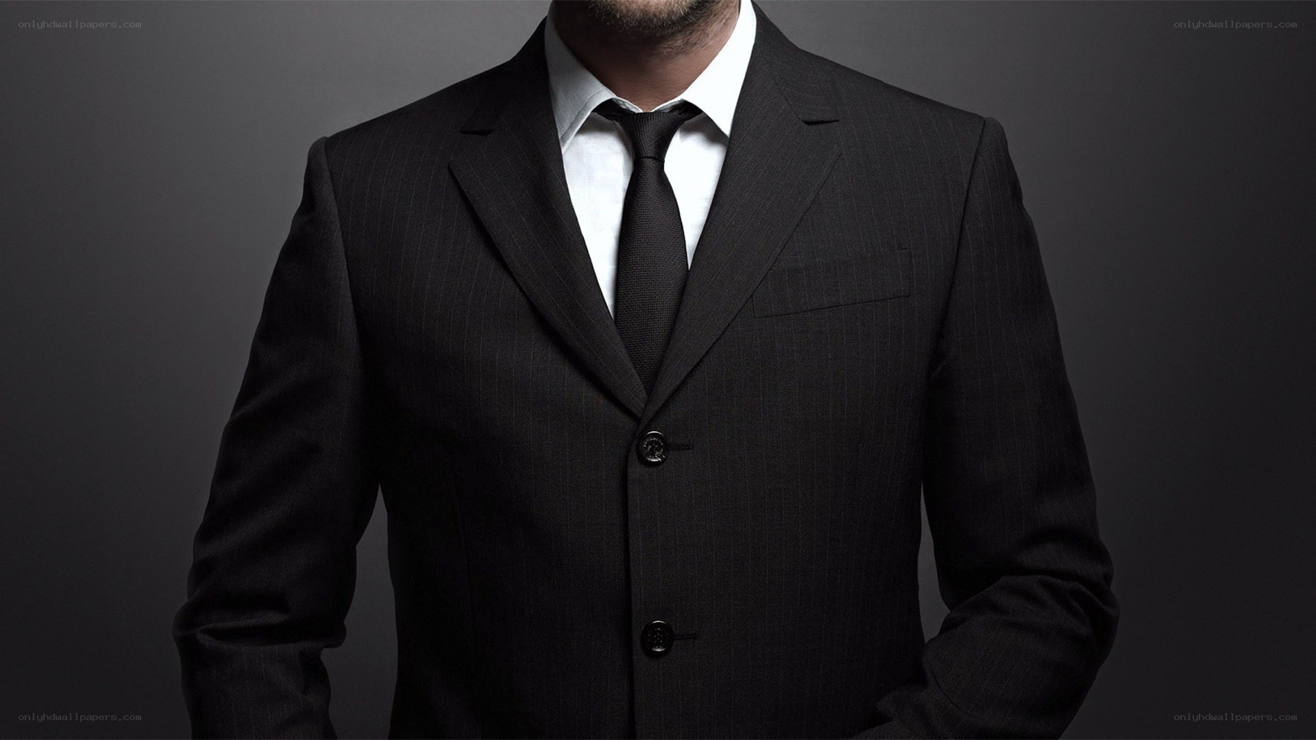 man in black suit
