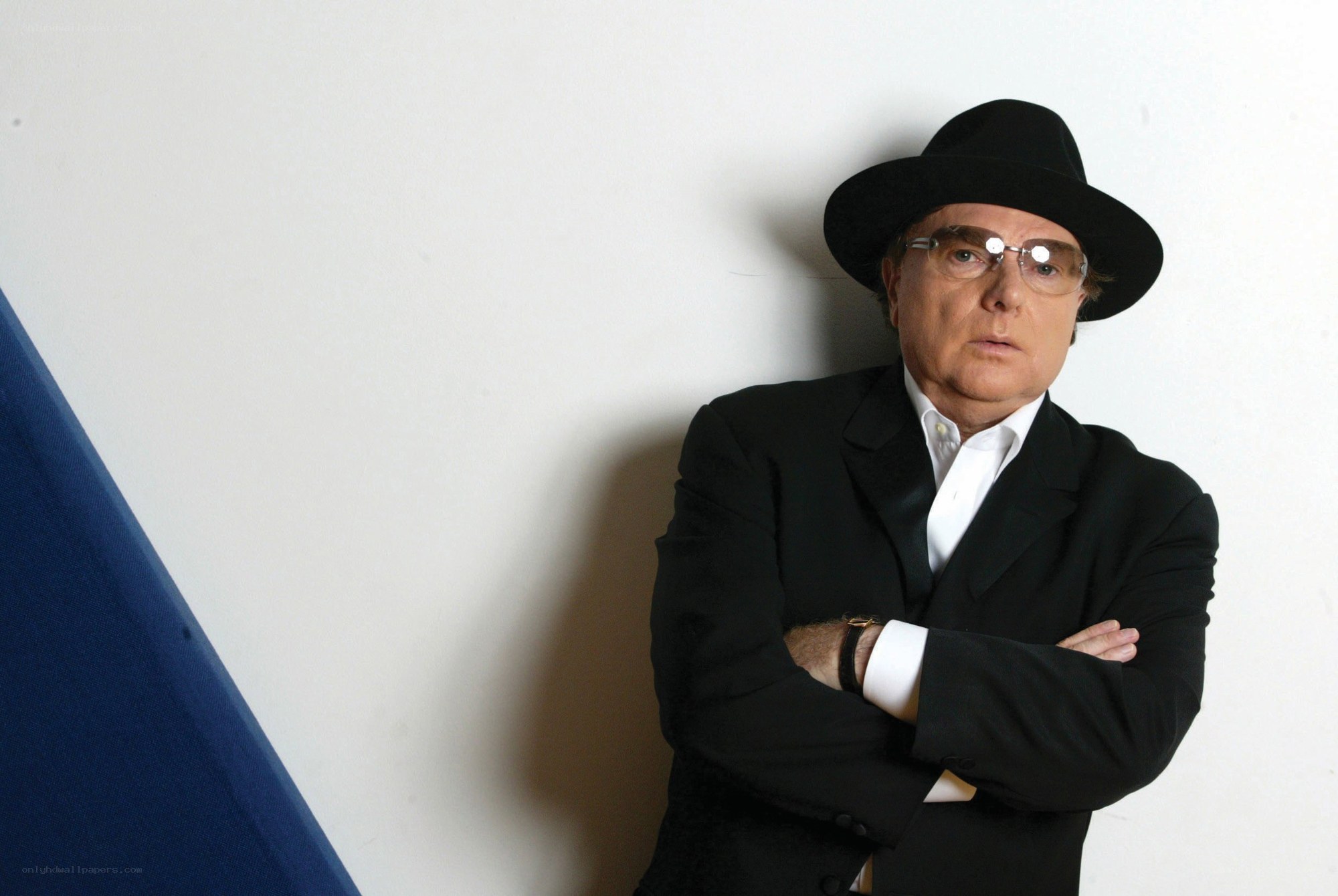 Man in black suit and hat
