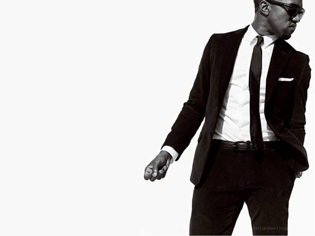 man in black suit and sunglasses