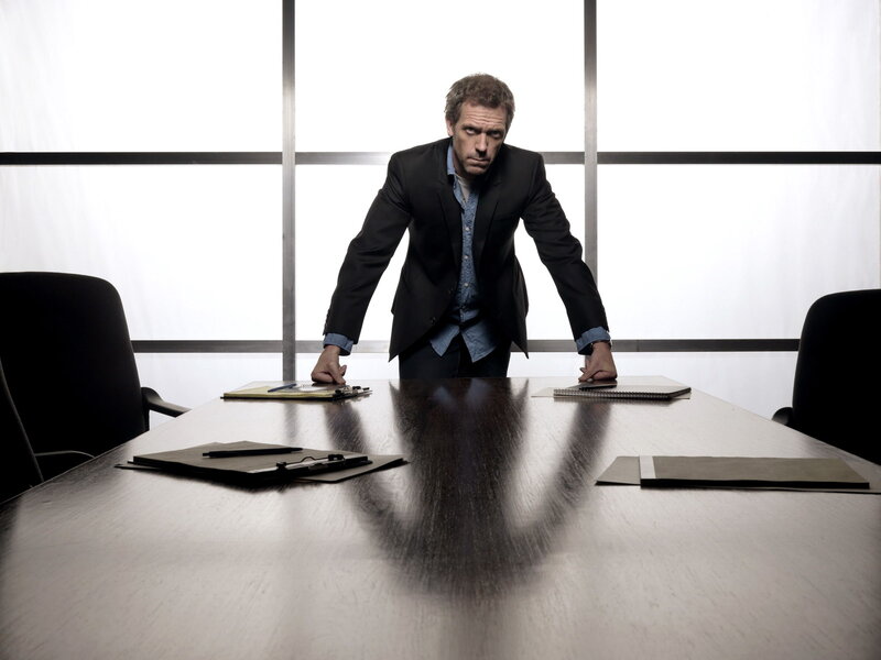 Man in Black Suit — Dramatic, Photograph, Desk