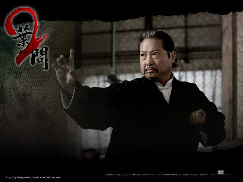 Man in Black Suit — Dramatic, Photograph, Hand Gesture