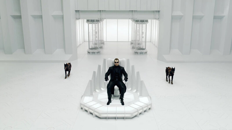 man in black suit on throne