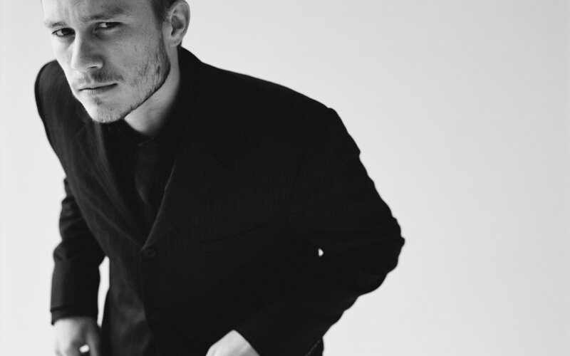 man in black suit portrait