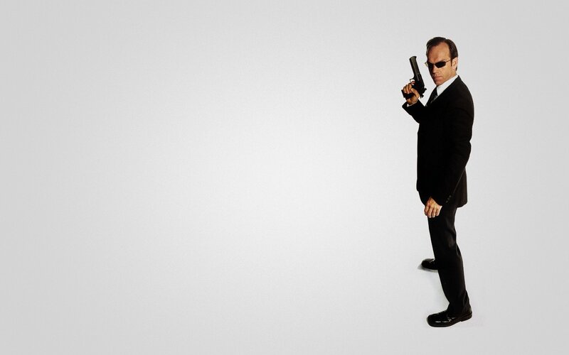 Man in Black Suit — Serious, Photograph, Gun