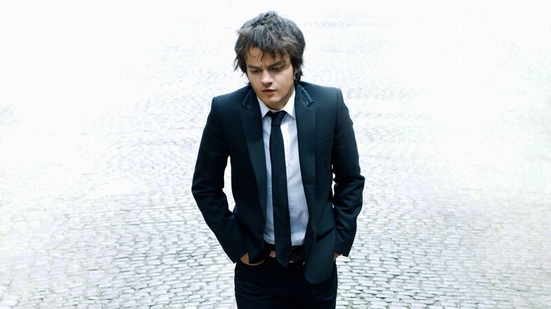 Man in Black Suit — Serious, Photograph, Tie, Cobblestone