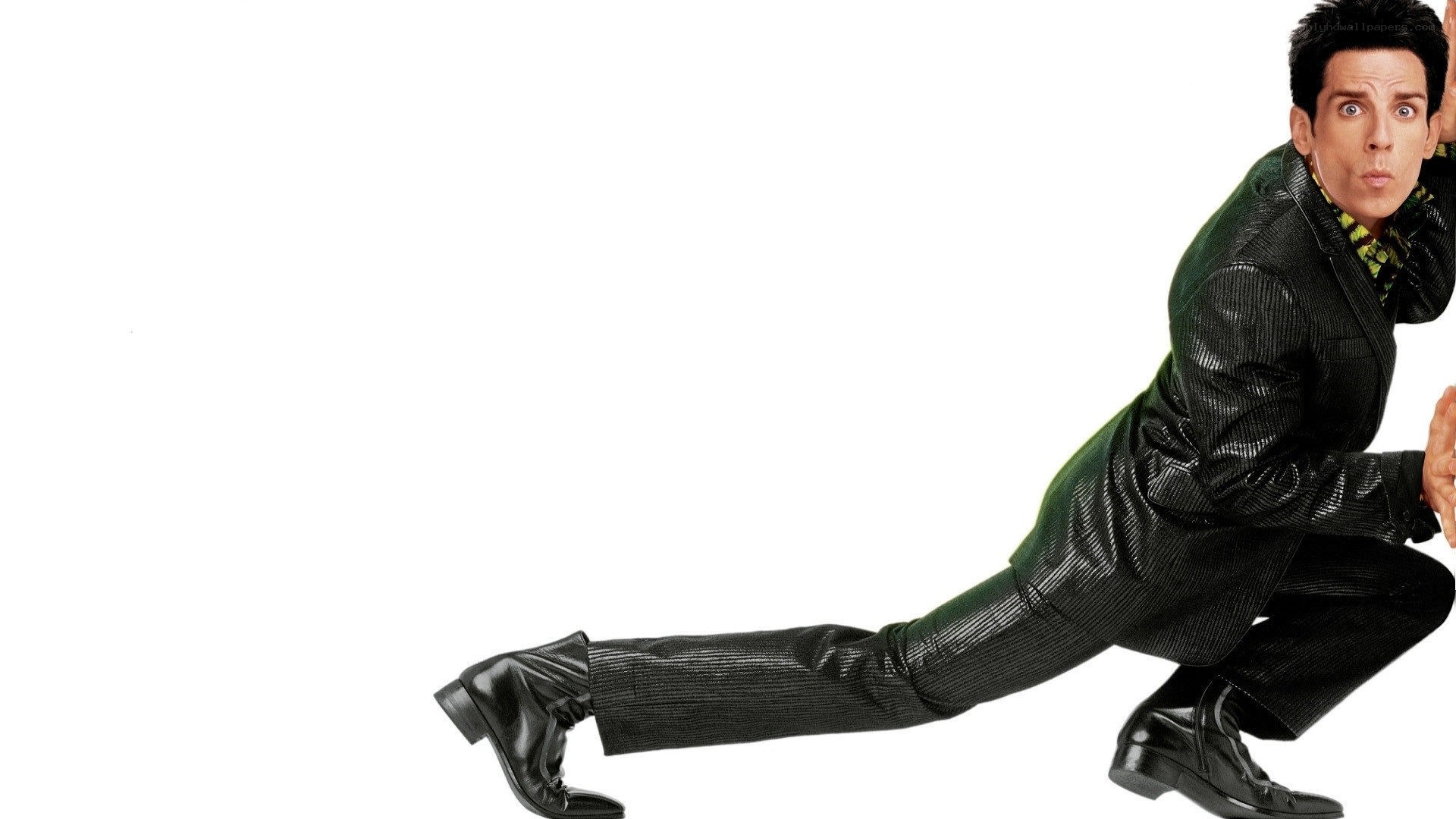 man in black suit stretching