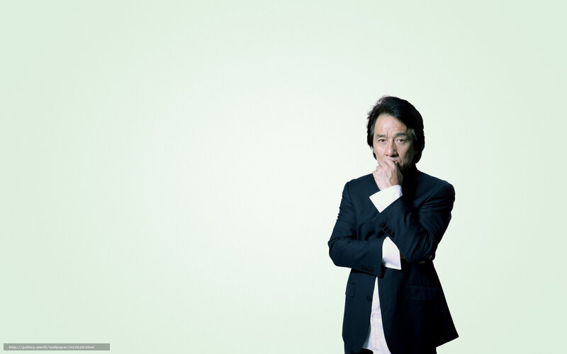 man in black suit thinking