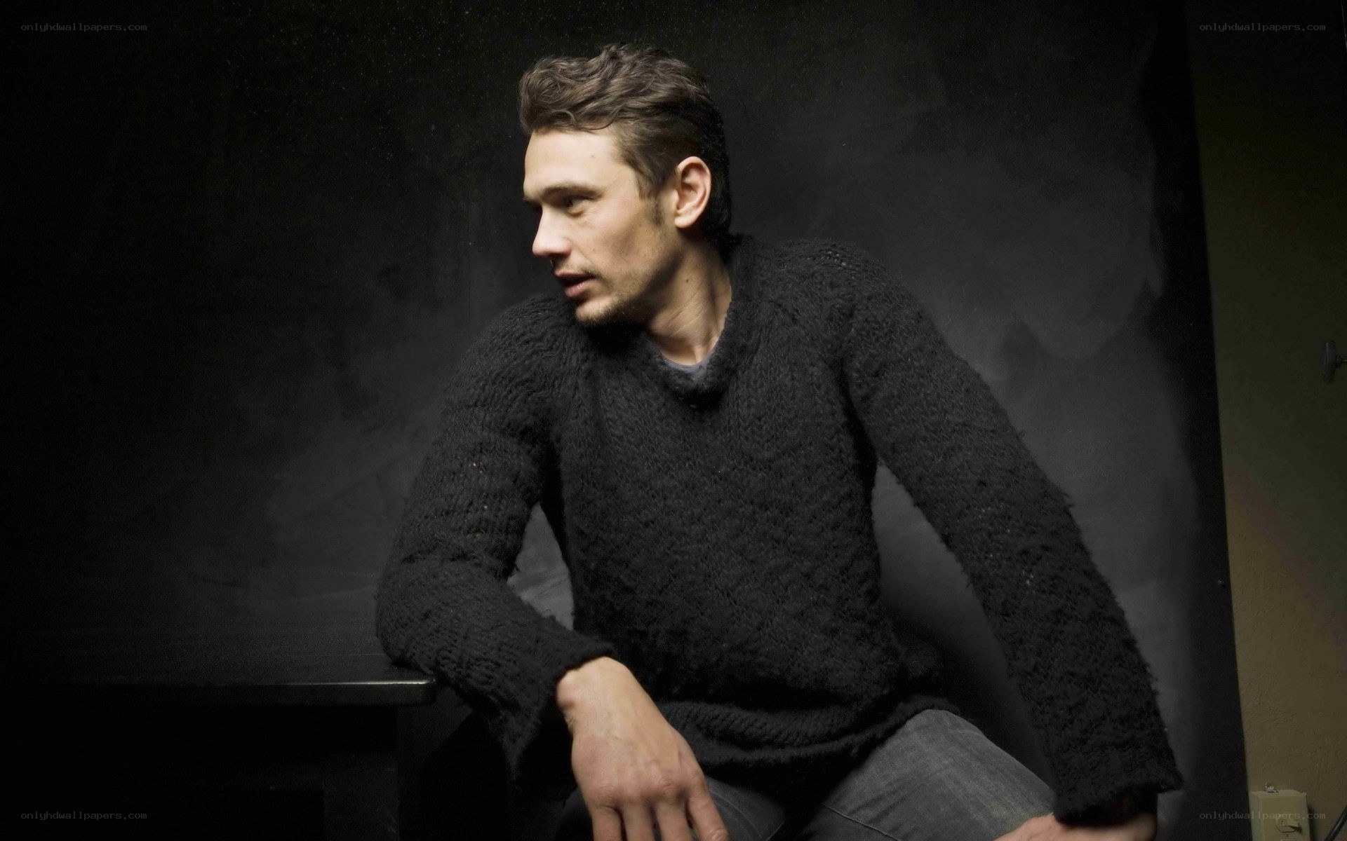 man in black sweater