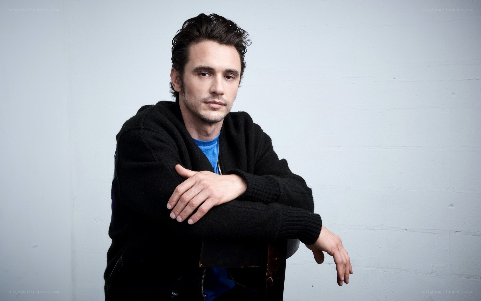 man in black sweater