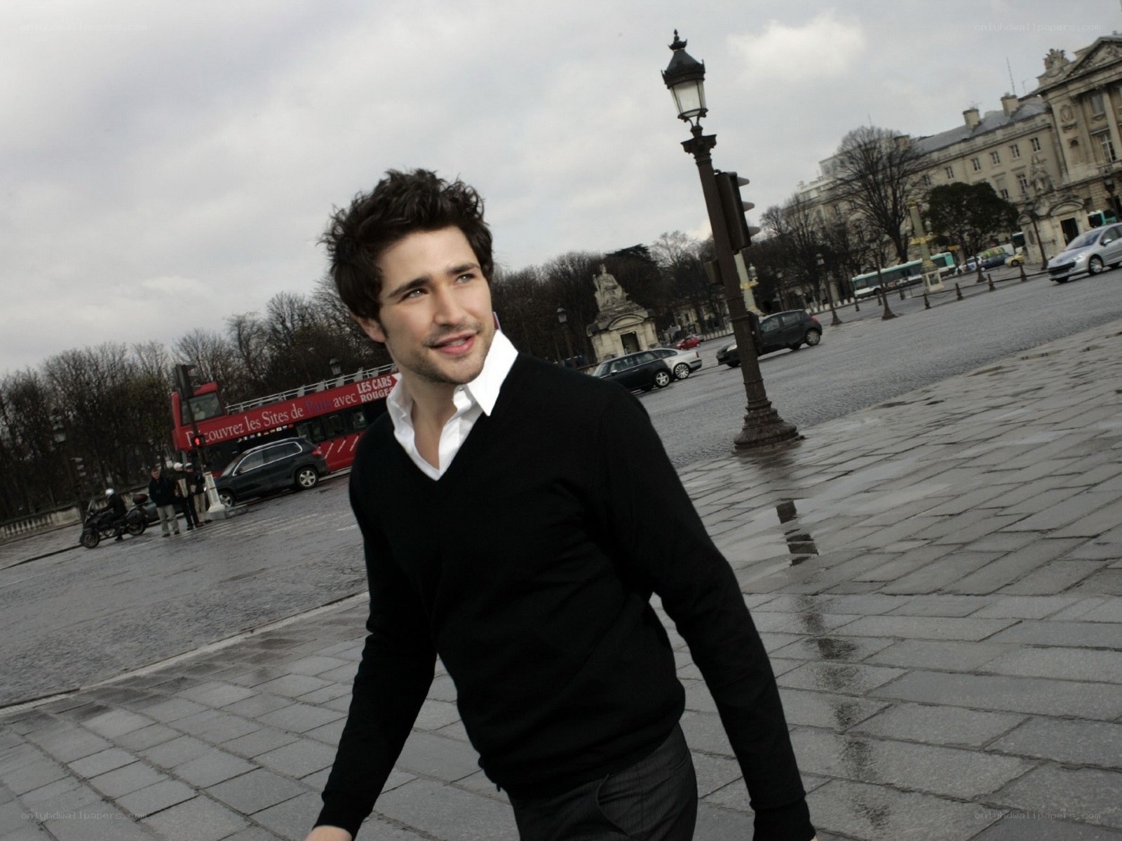 man in black sweater in paris