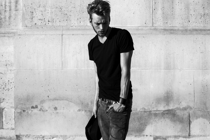 Man in Black T-shirt — Dramatic, Photograph, Concrete Wall