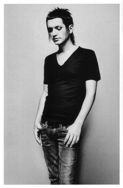 man in black v-neck shirt