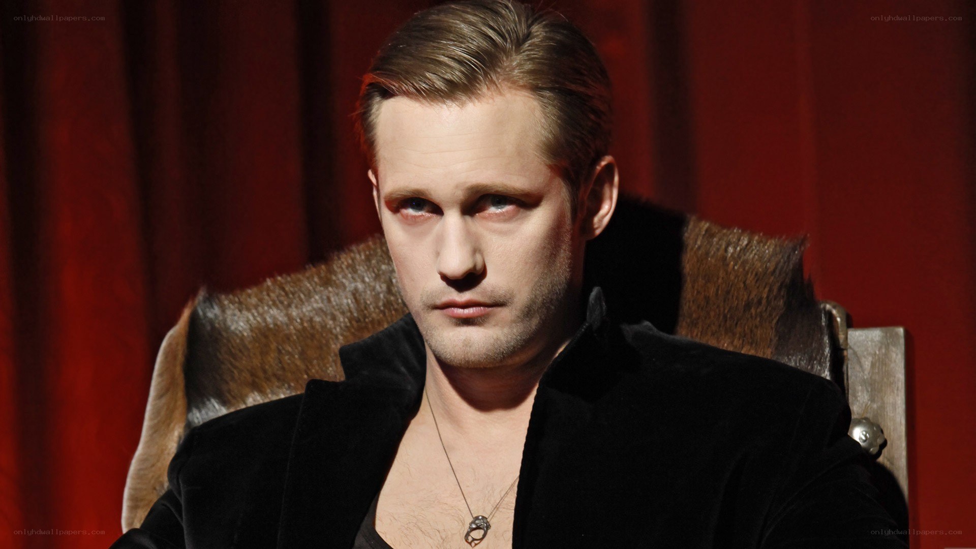 man in black velvet jacket