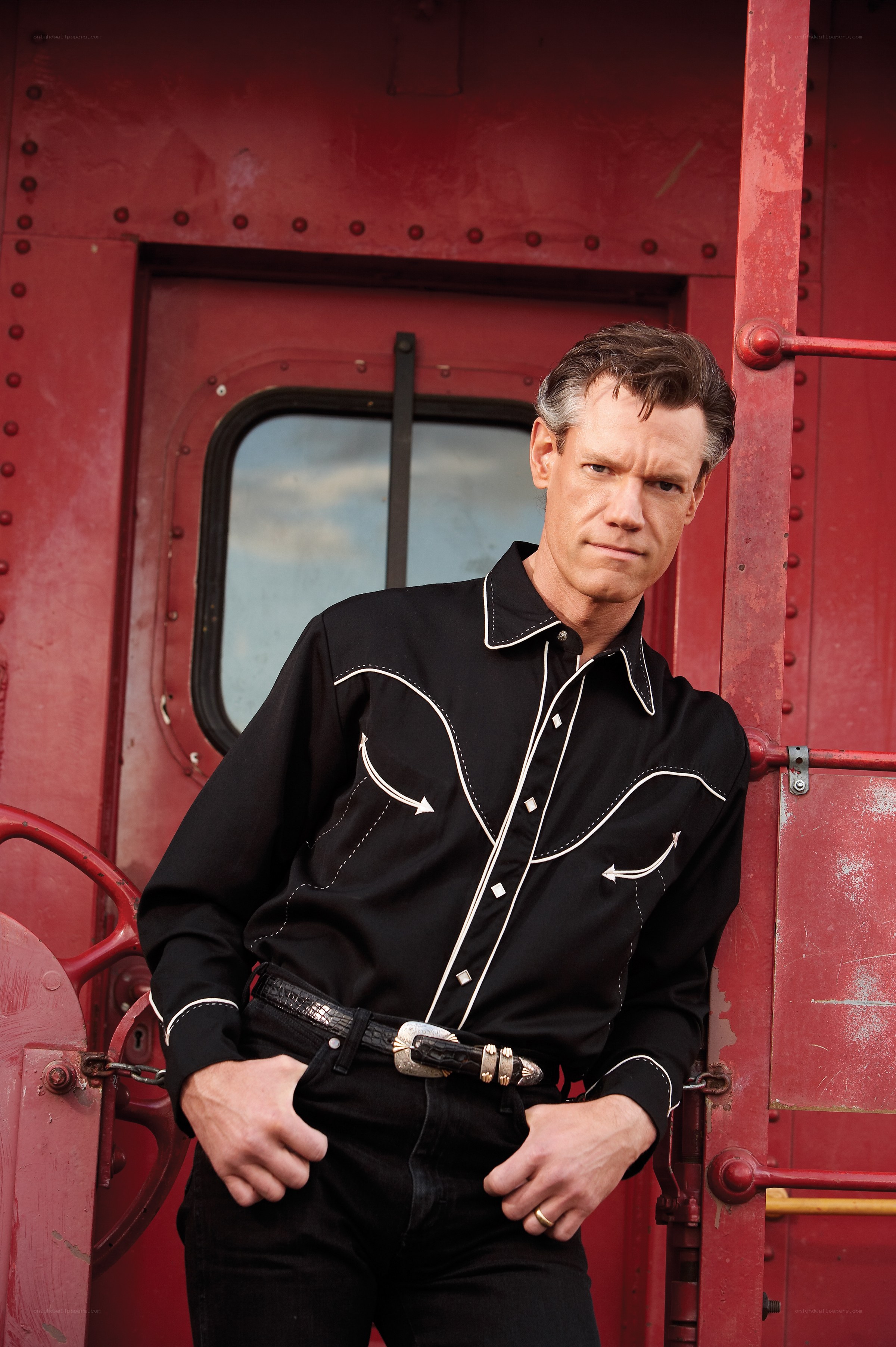 man in black western shirt